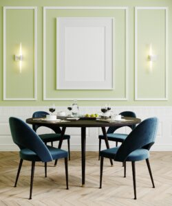Dining room with blue chairs and lamps
