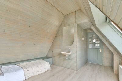Mansard bedroom with minimalist interior design